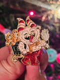 Animated character with a broom and gingerbread man on a colorful blurred background