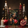 Tarot box of the 'W.I.T.C.H. Tarot' with a woman holding a pomegranate and floral background.