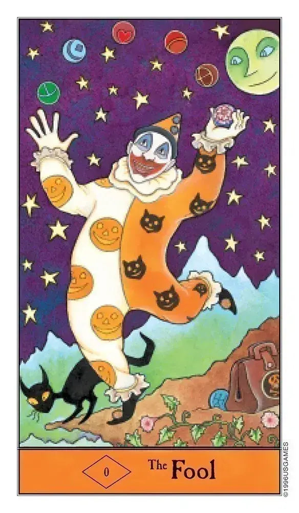 Card featuring a clown with pumpkin patterns against a starry night sky, labeled 'The Fool'.