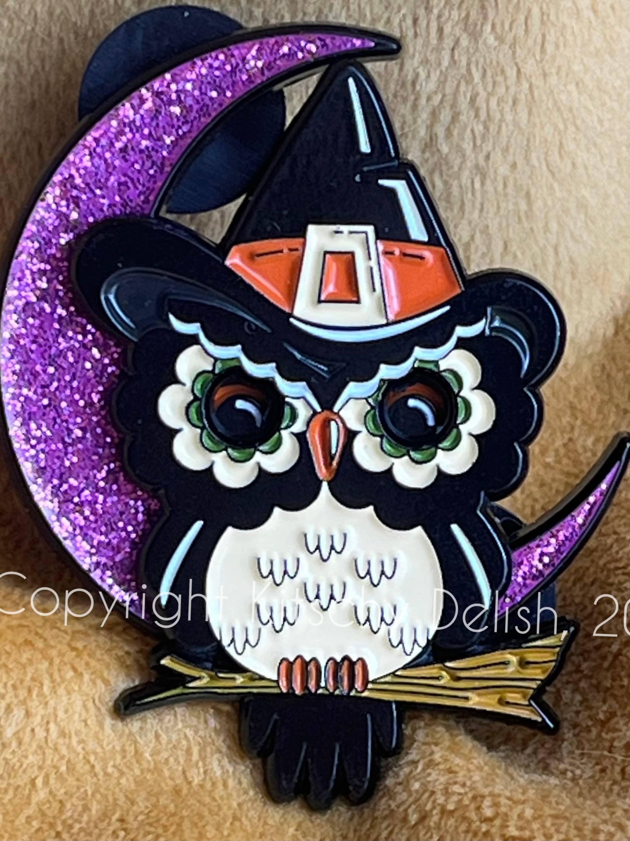 Halloween-themed owl with witch hat and purple crescent moon on a textured background