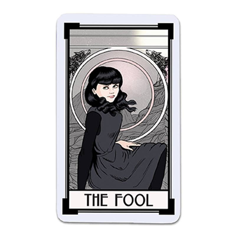 Tarot card titled 'The Fool' featuring a woman with long hair and a dark dress on a white background.